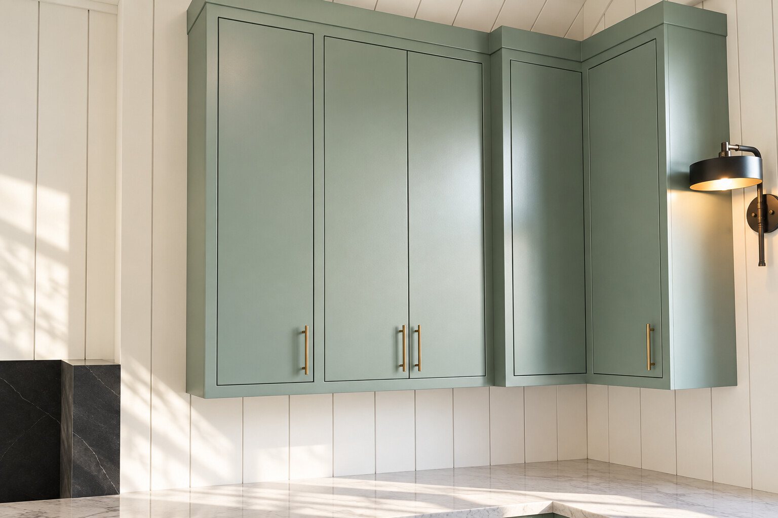 Sage green cabinet doors finished by Alberto's Cabinets in Phoenix